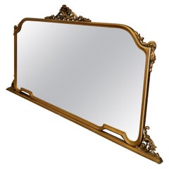 A Large Gilt Over Mantle Mirror    This Mirror has a beautiful Gold Frame  