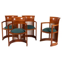 Suite de quatre fauteuils “Barrel chairs 606” conçus par Frank Lloyd Wright