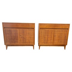 Pair cherrywood and rattan cabinets with bar 
