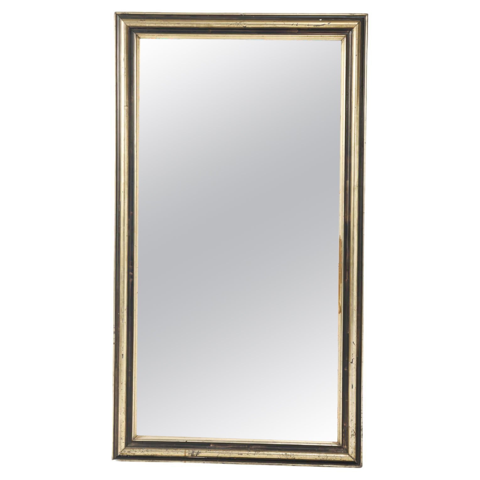 French mirror with partial ebonized and gilt frame C 1860. For Sale