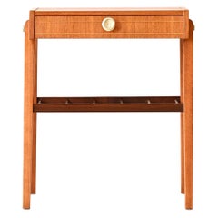 Retro teak nightstand with gold metal details