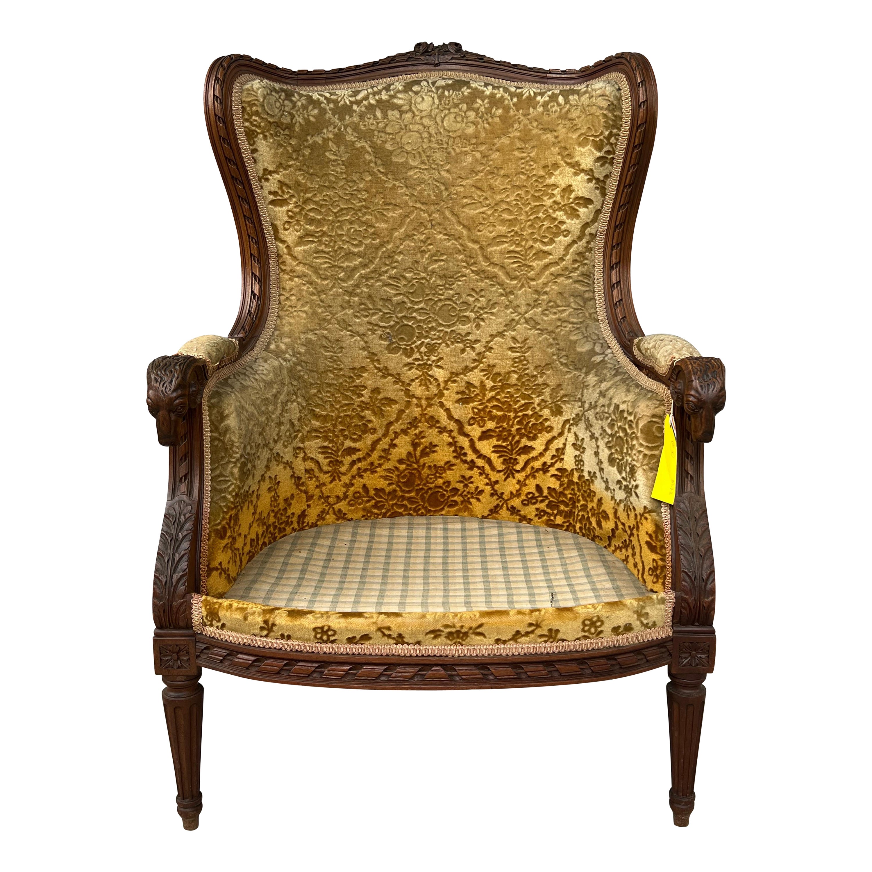 19Th Century French Louis XVI Style Carved Walnut Bergere Chair For Sale