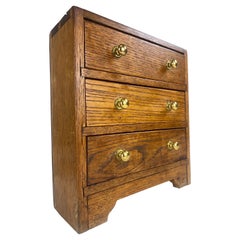 Antique hand made rustic miniature chest of drawers.