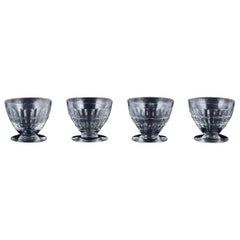 Baccarat, France, set of four "Charmes" Art Deco red wine glasses.