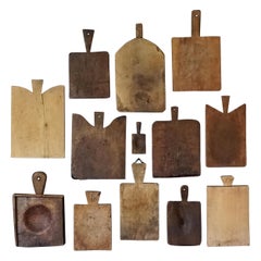 Thirteen 19th C. French Wooden Chopping or Cutting Boards and a Chocolate Mould