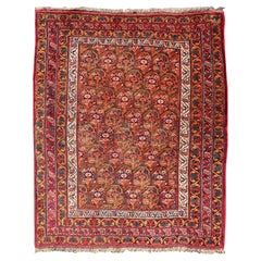  Tapis persan ancien Afshar à fond orange et cuivre et multicolore