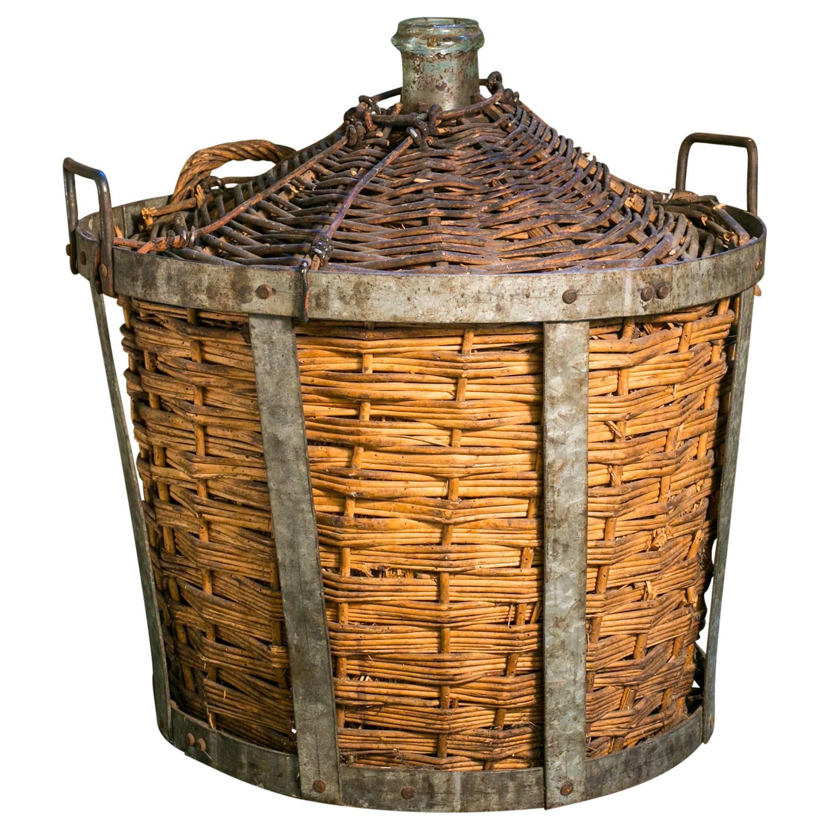 Antique Demi-John in Original Handwoven Rattan and Zinc Basket