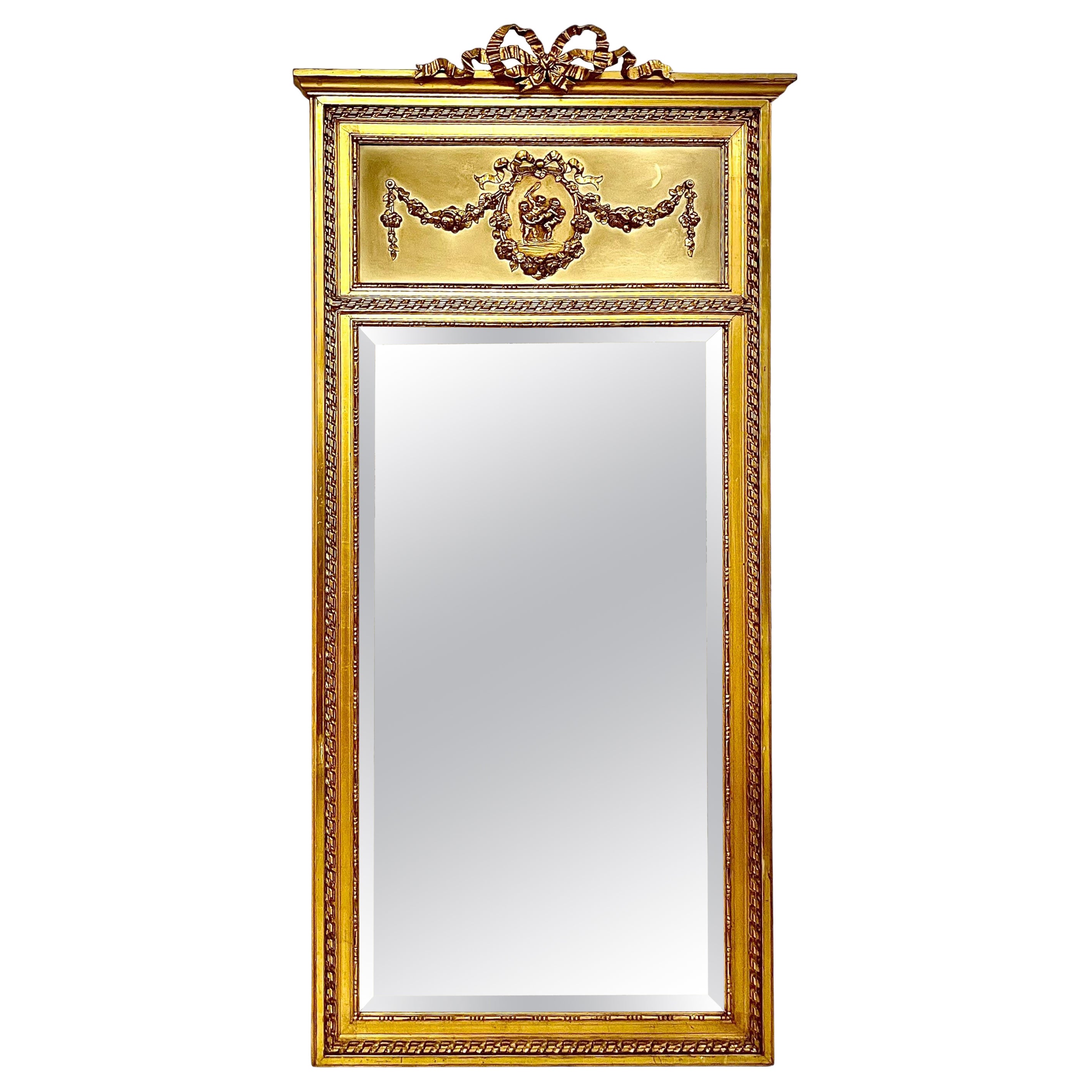  19th Century Louis XVI Trumeau Gilded Mirror with Mischievous Cherubs Design
