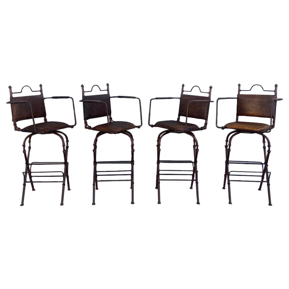 1940s Rustic Industrial Iron and Buffalo Leather Swivel Stools, Set of 4 For Sale