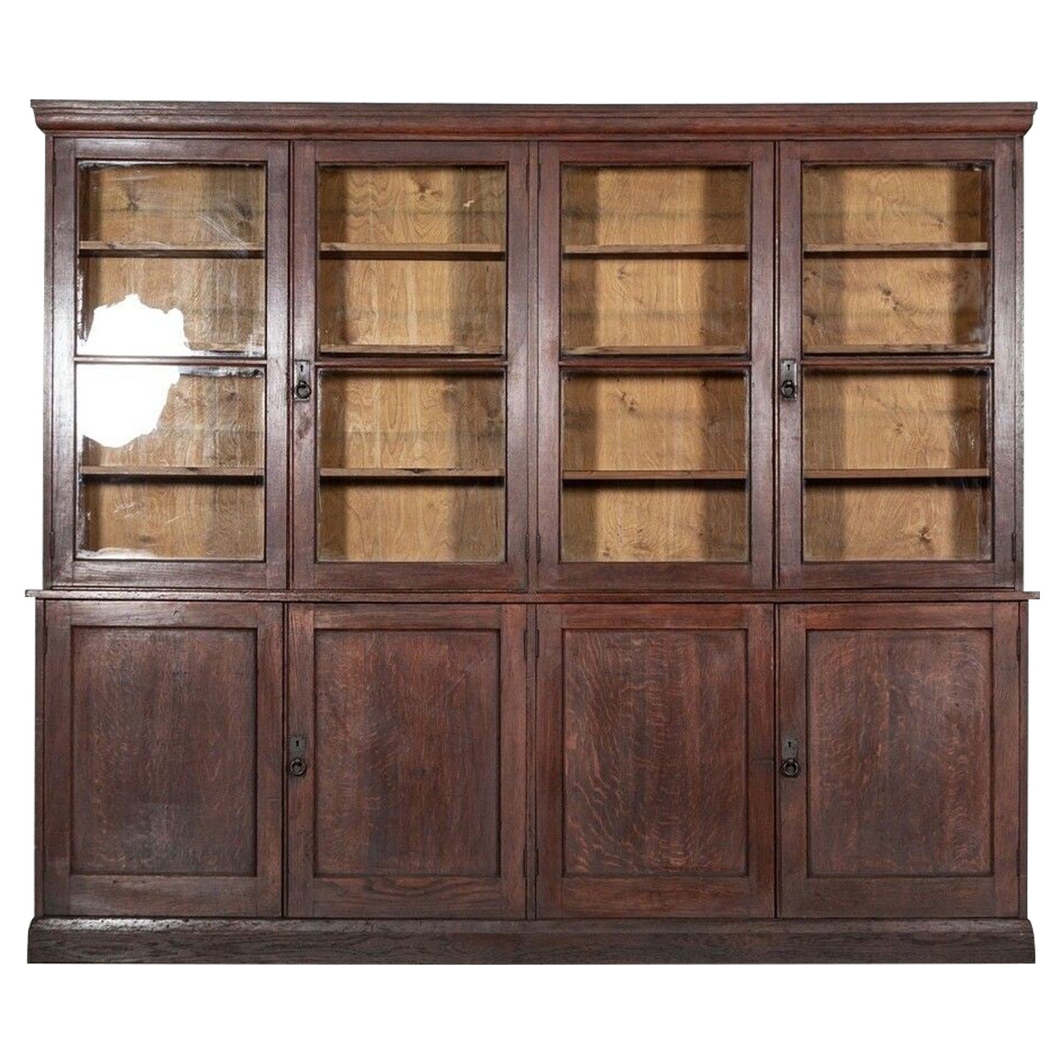 Monumental English Oak Glazed Bookcase For Sale