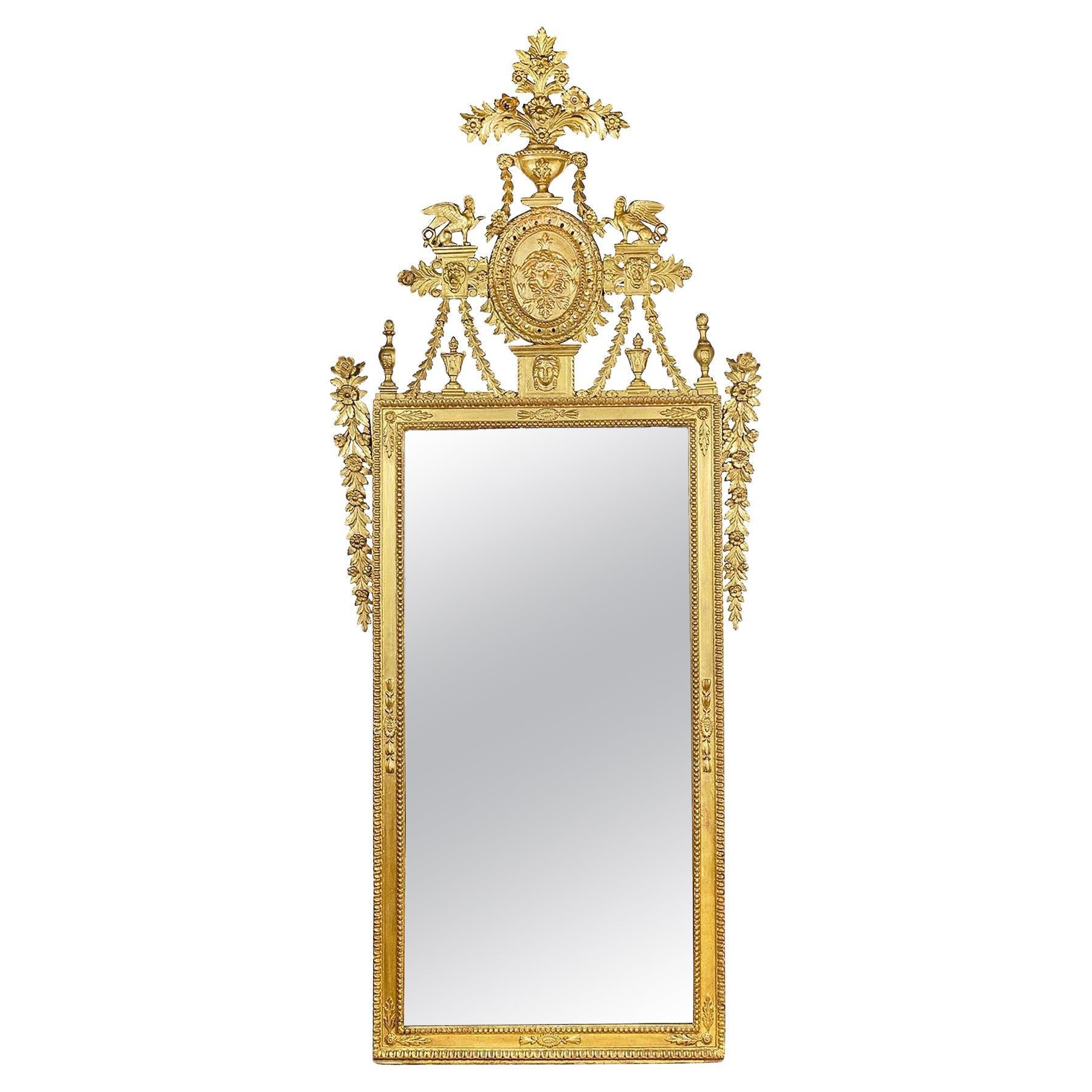 18th Century Italian carved gilt wood Neoclassical wall mirror. For Sale