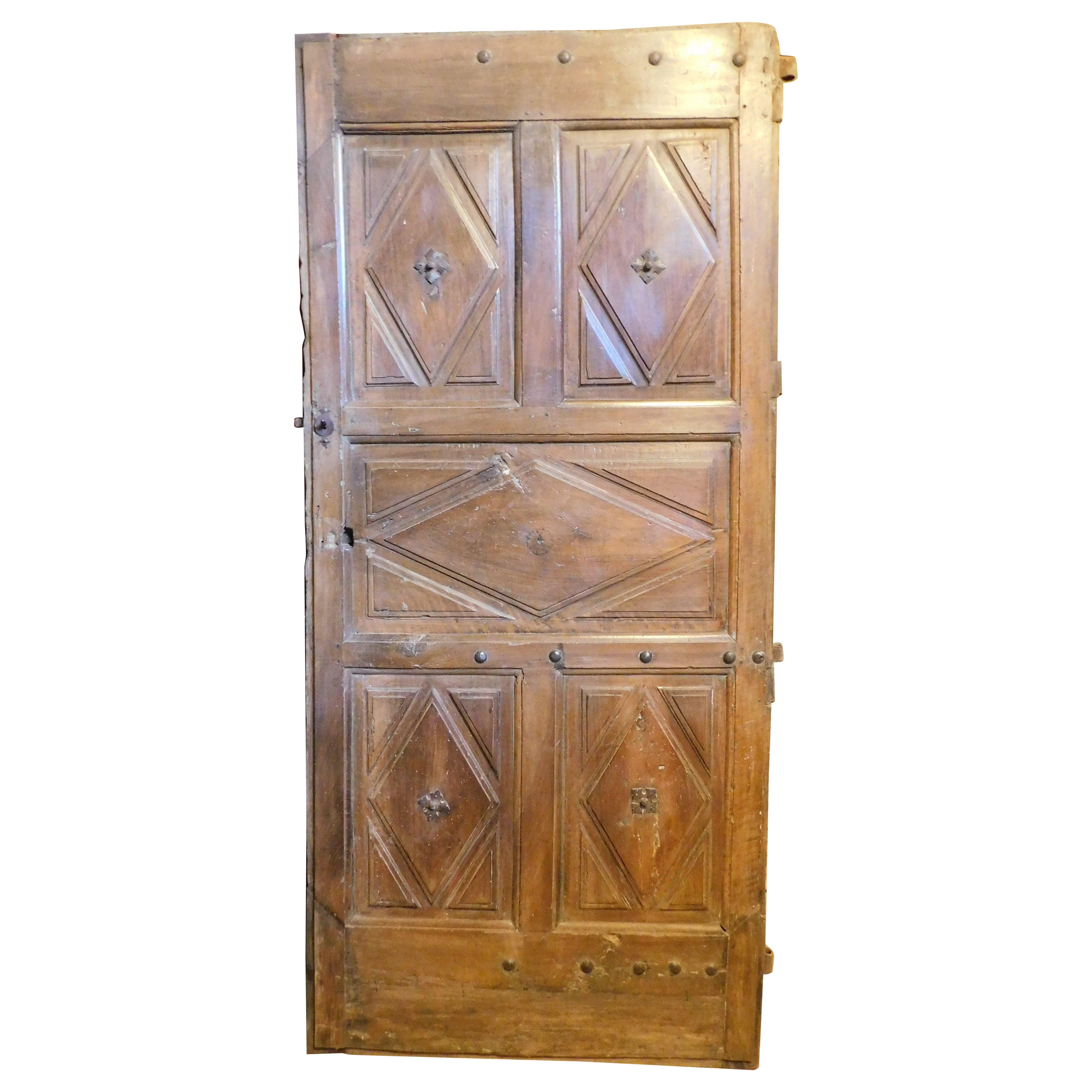 Interior wooden door with diamond-shaped carved panels, Italy For Sale