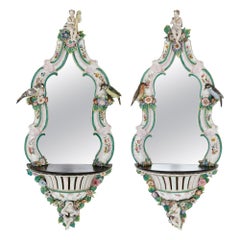Pair of Meissen Style Porcelain and Ebonised Wood Mirrored Wall Brackets