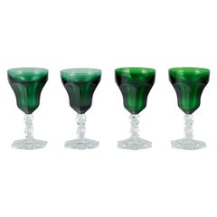 Val St. Lambert, Belgium. Four "Lalaing" white wine glasses in green glass