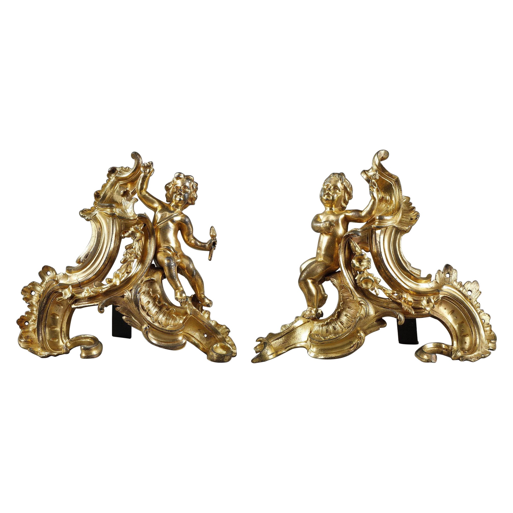 Paire de chenets Louis XV en bronze doré