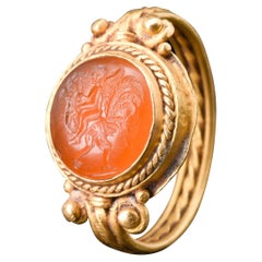 Roman Carnelian Intaglio with Mercury Riding a Rooster in Gold Ring