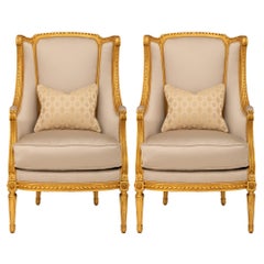 Pair Of French 19th Century Louis XVI St. Giltwood Bergère Armchairs