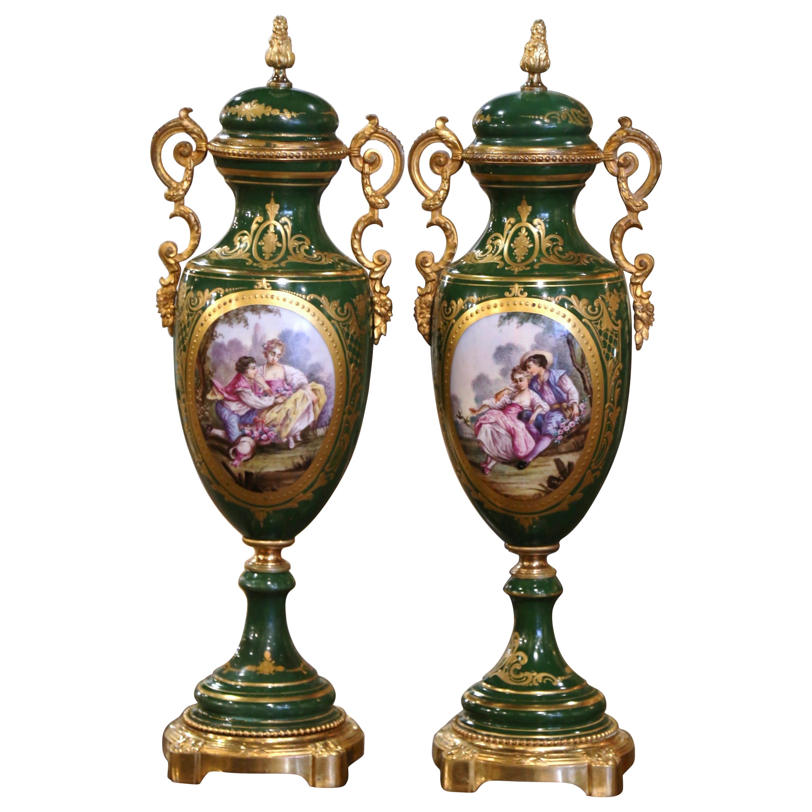 Pair of 19th Century French Sevres Gilt Metal and Painted Porcelain Covered Urns For Sale