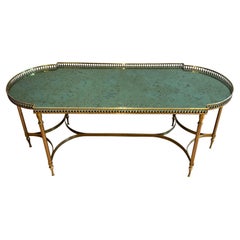 Neoclassical Style Brass Coffee Table in the style of Maria Pergay. Circa 1940