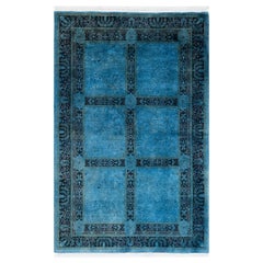 Tapis de sol contemporain en laine surteinte nouée à la main, bleu
