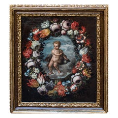 Huile sur toile Enfant Jésus dans une guirlande de fleurs 18e siècle