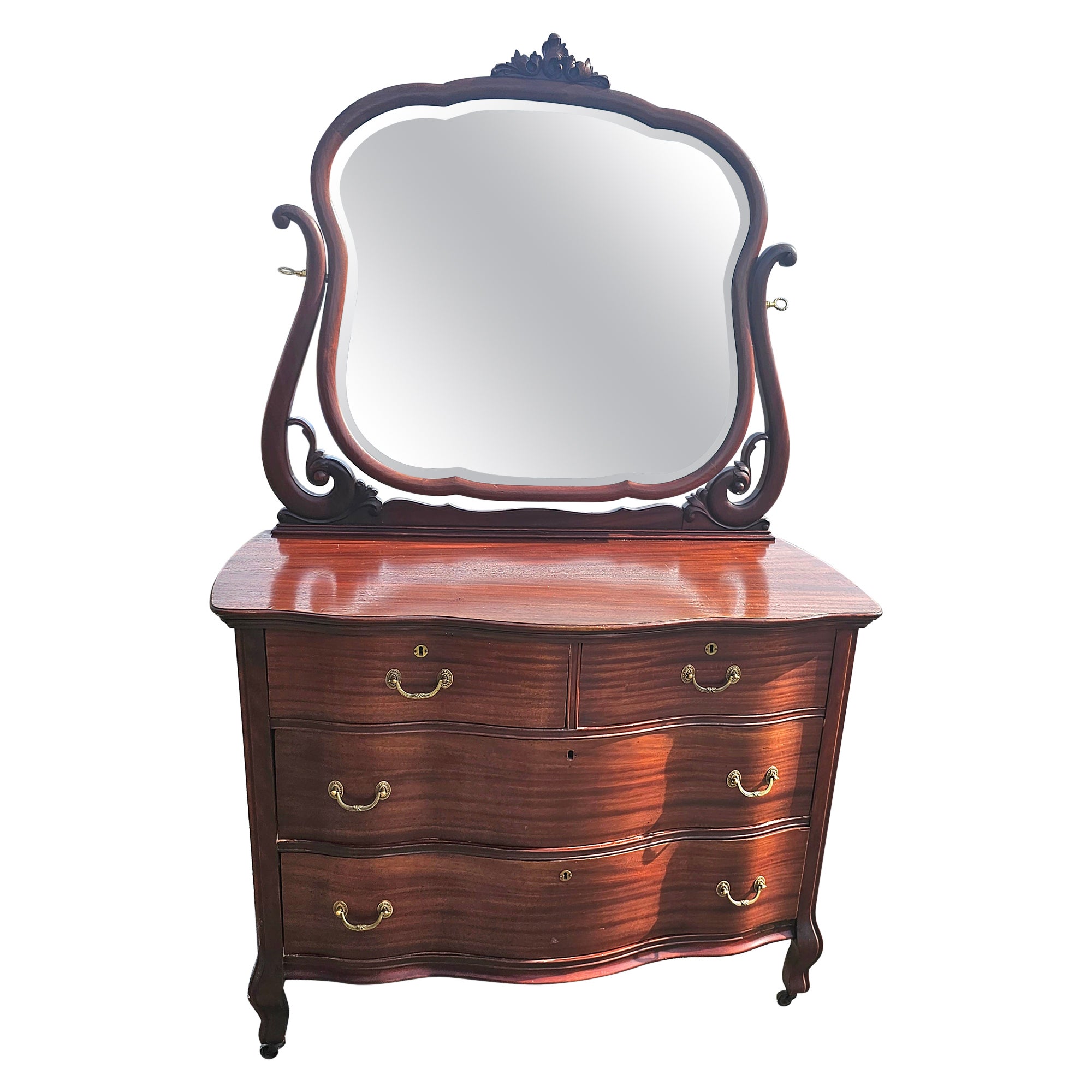 Early 20th Century Widdicomb Mahogany Serpentine Chest with Mirror on Wheels