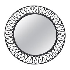 Specchio a forma di ghirigoro in ferro del metà del secolo scorso