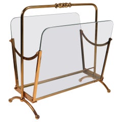 Used Mid century  magazine rack, brass and glass, Italy 1950-1960