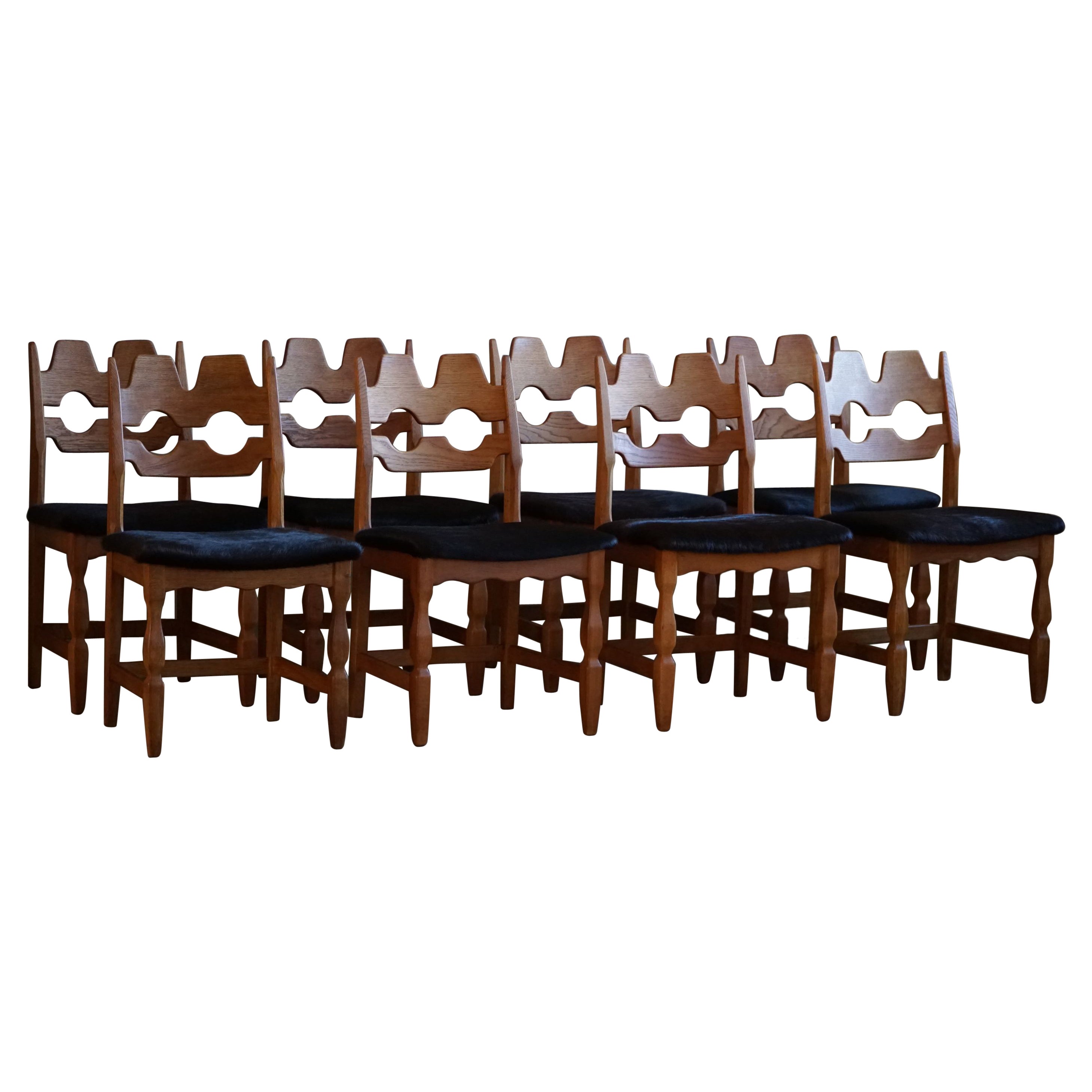 Henning Kjærnulf, ensemble de 8 chaises de salle à manger "Razorblade" en Oak et peau de vache, 1960s en vente