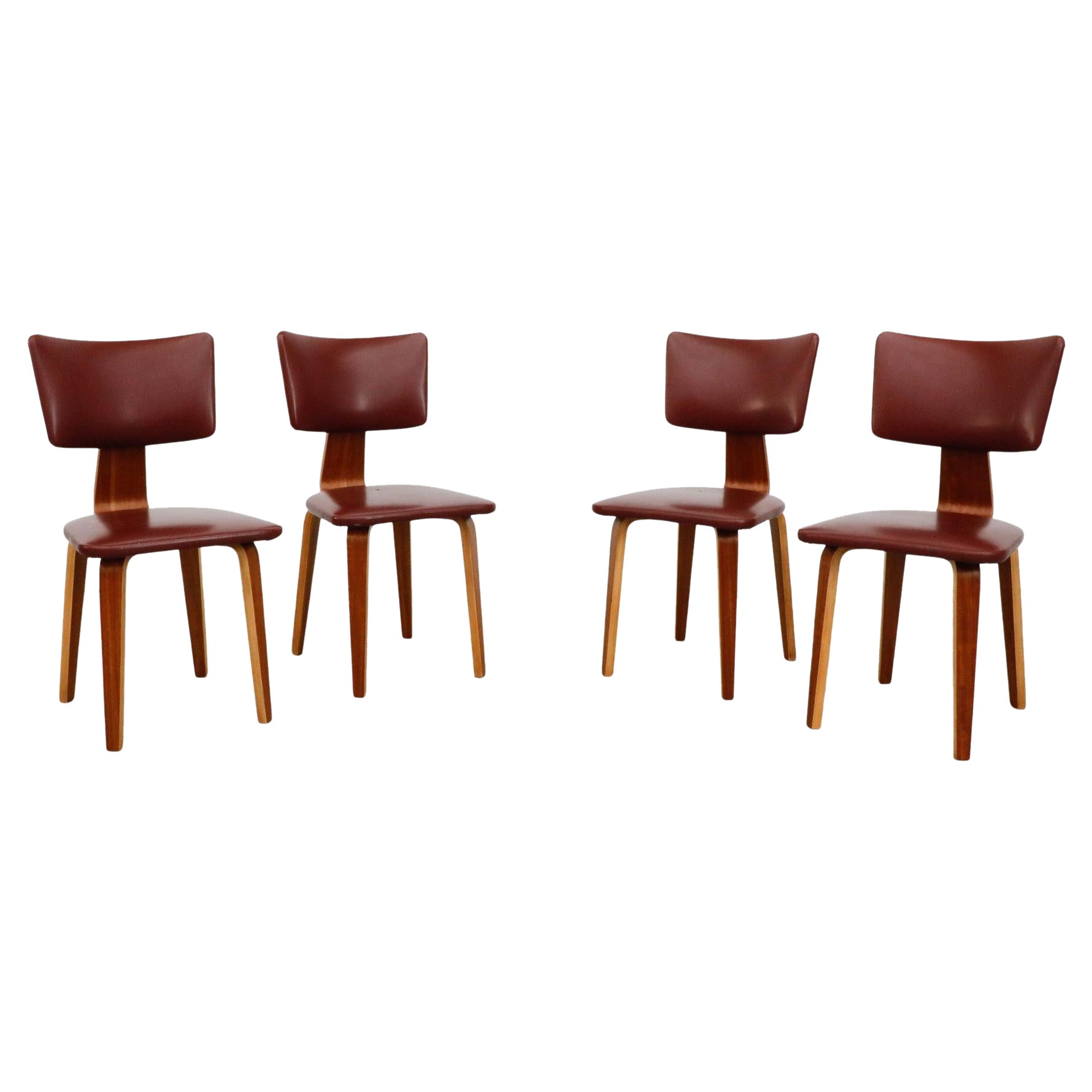 Set of Four Cor Alons Teak and Burgundy Skai Side or Dining Chairs
