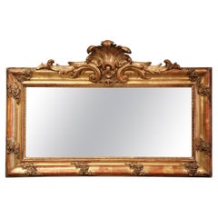 Miroir mural Louis XV du 19ème siècle en bois doré sculpté avec cartouche en coquillage