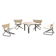 Four Z-Down folding lounge chairs and table by Erik Magnussen, Torben Ørskov