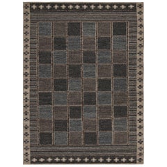 Rug & Kilim’s “Nu” Scandinavian Style Rug in Blue with Geometric Patterns