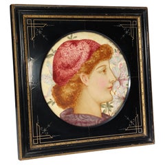 J P Hewitt. Aesthetic Movement circular plaque with a Pre-Raphaelite girls head.