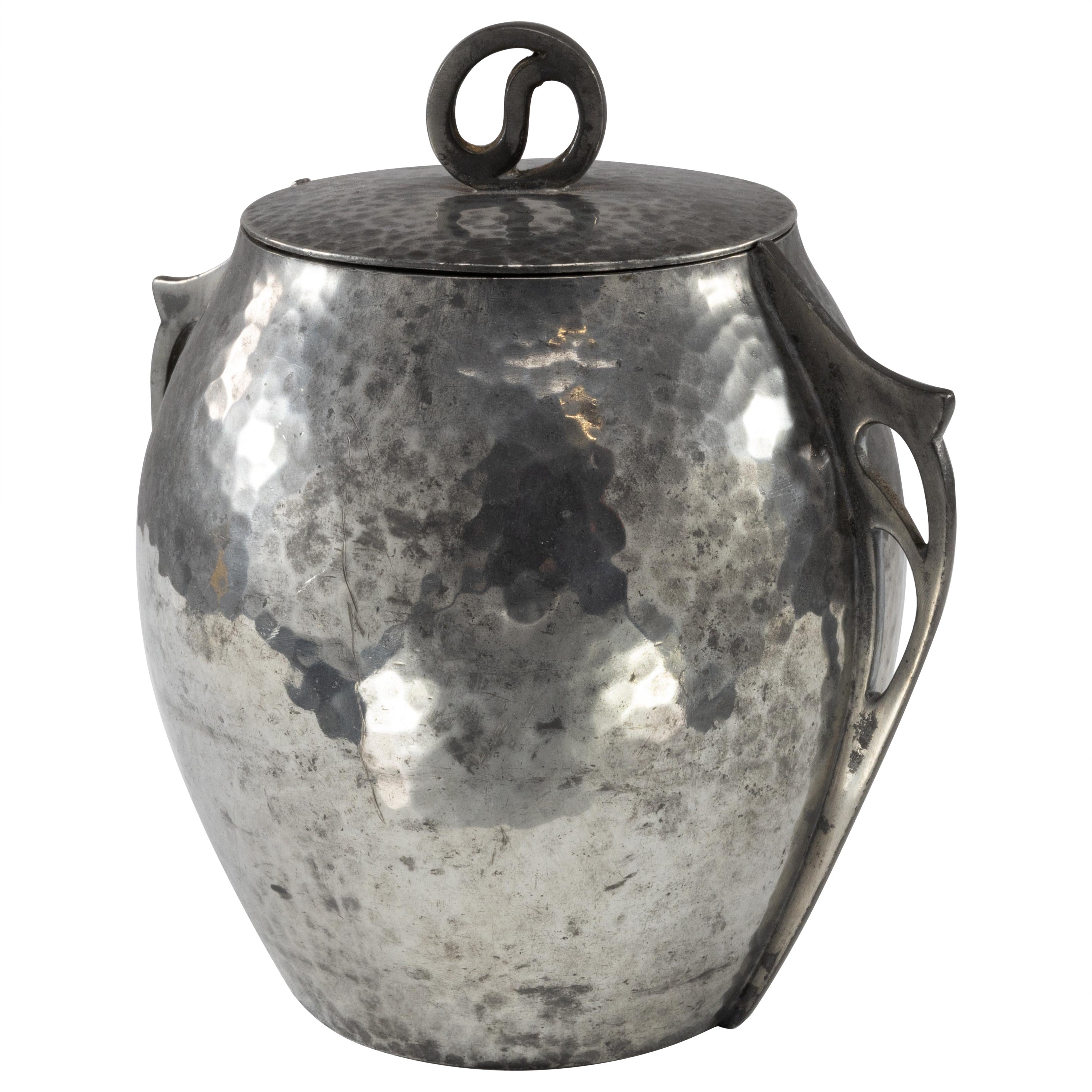 William Hutton and Sons for Liberty and Co. Hand hammered pewter biscuit barrel For Sale