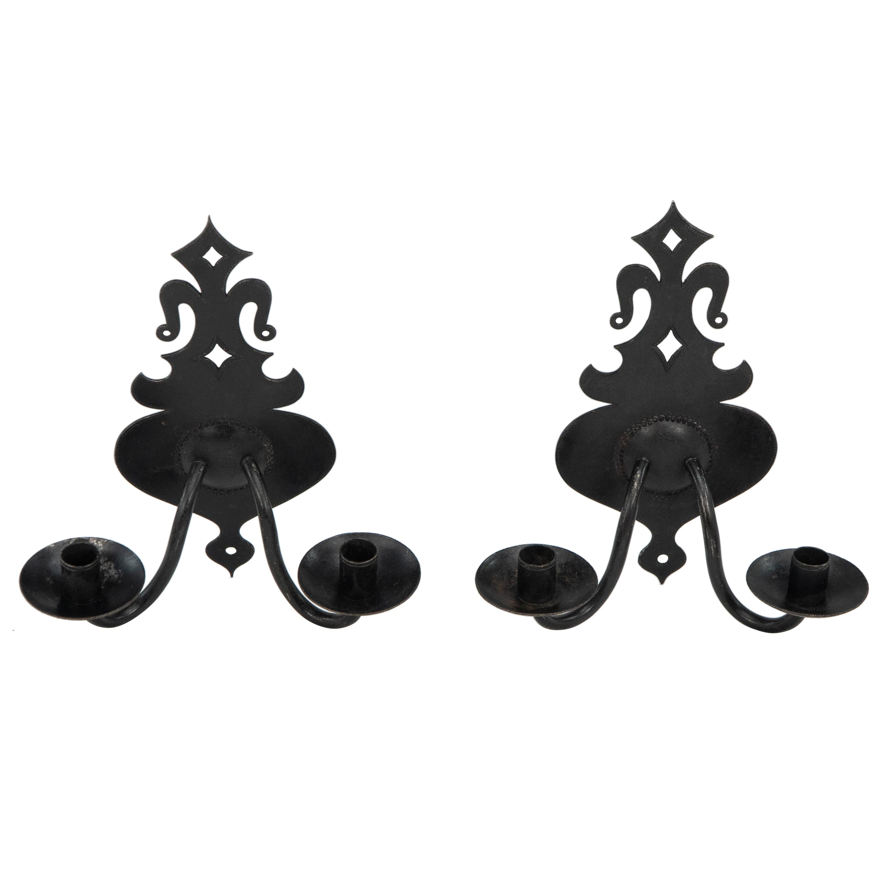 Alfred Bucknell. A rare pair of Arts & Crafts museum quality steel wall sconces. For Sale