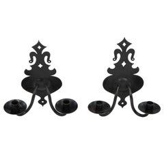 Antique Alfred Bucknell. A rare pair of Arts & Crafts museum quality steel wall sconces.