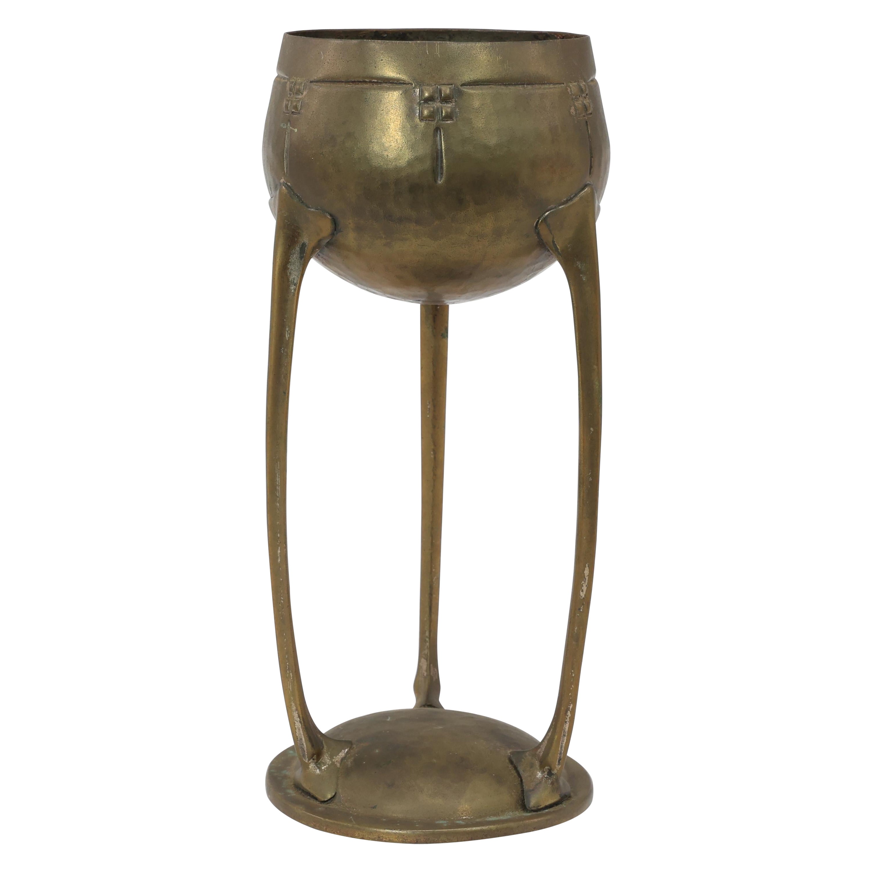 WMF. A hand beaten brass chalice, the bowl raised on three organic supports. For Sale