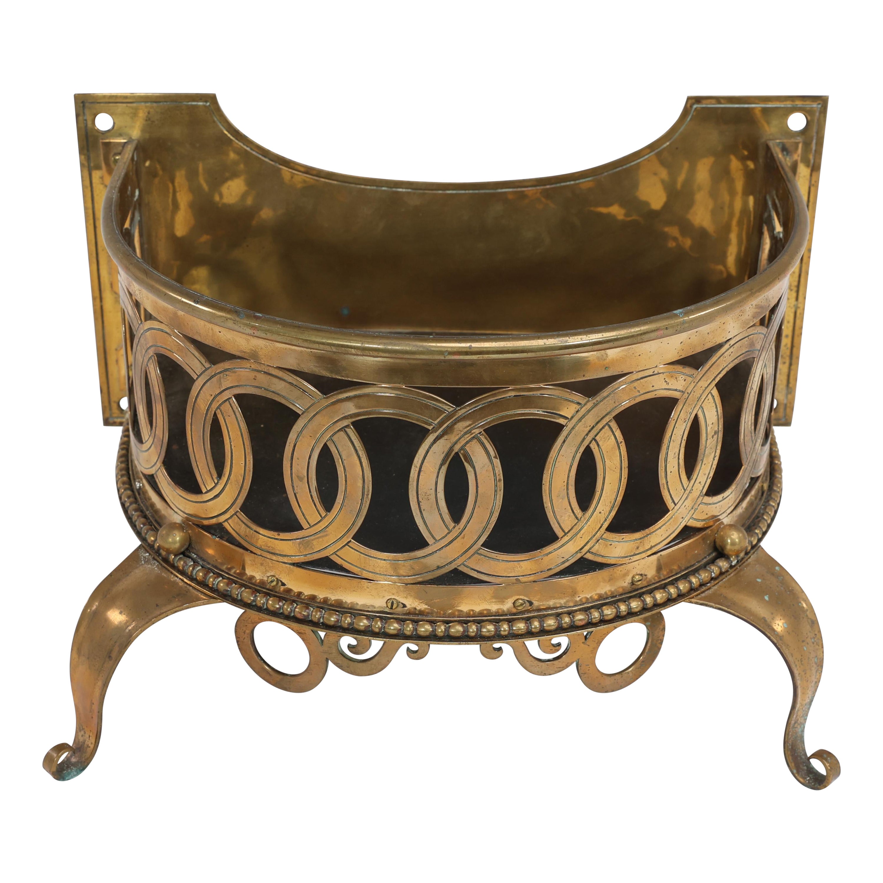 Birmingham Guild of Handicraft attributed. A gilded semi-circular brass planter. For Sale