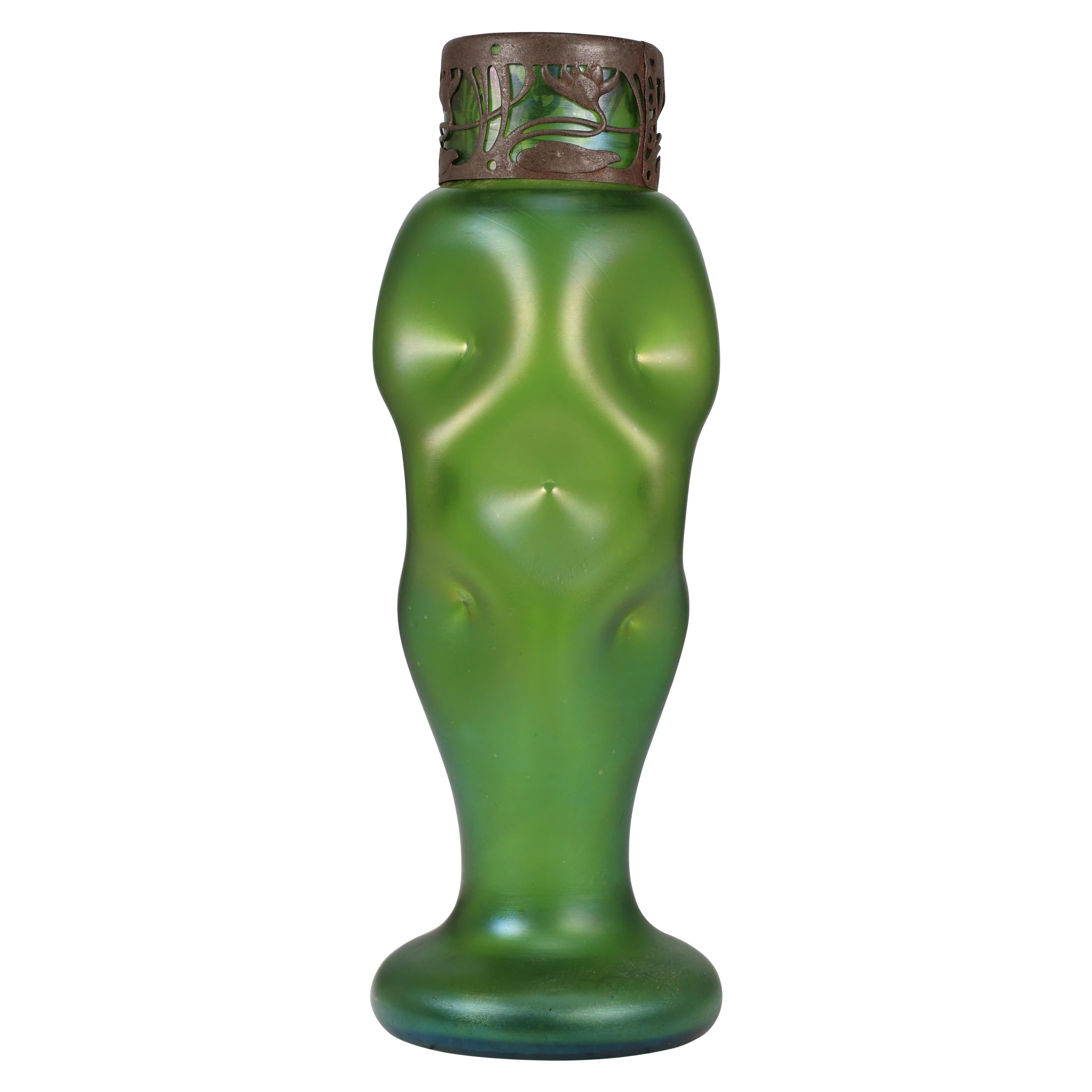 Loetz attr. A tall Art Nouveau green iridescent vase with brass floral collar. For Sale