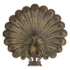 Antique An Aesthetic Movement heavy cast brass peacock trivet with fine detailing