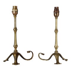 Antique WAS Benson. A pair of Arts & Crafts brass table lamps with a serpent style tails
