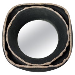 Black and pink glazed ceramic mirror by Mia Jensen, 2023.