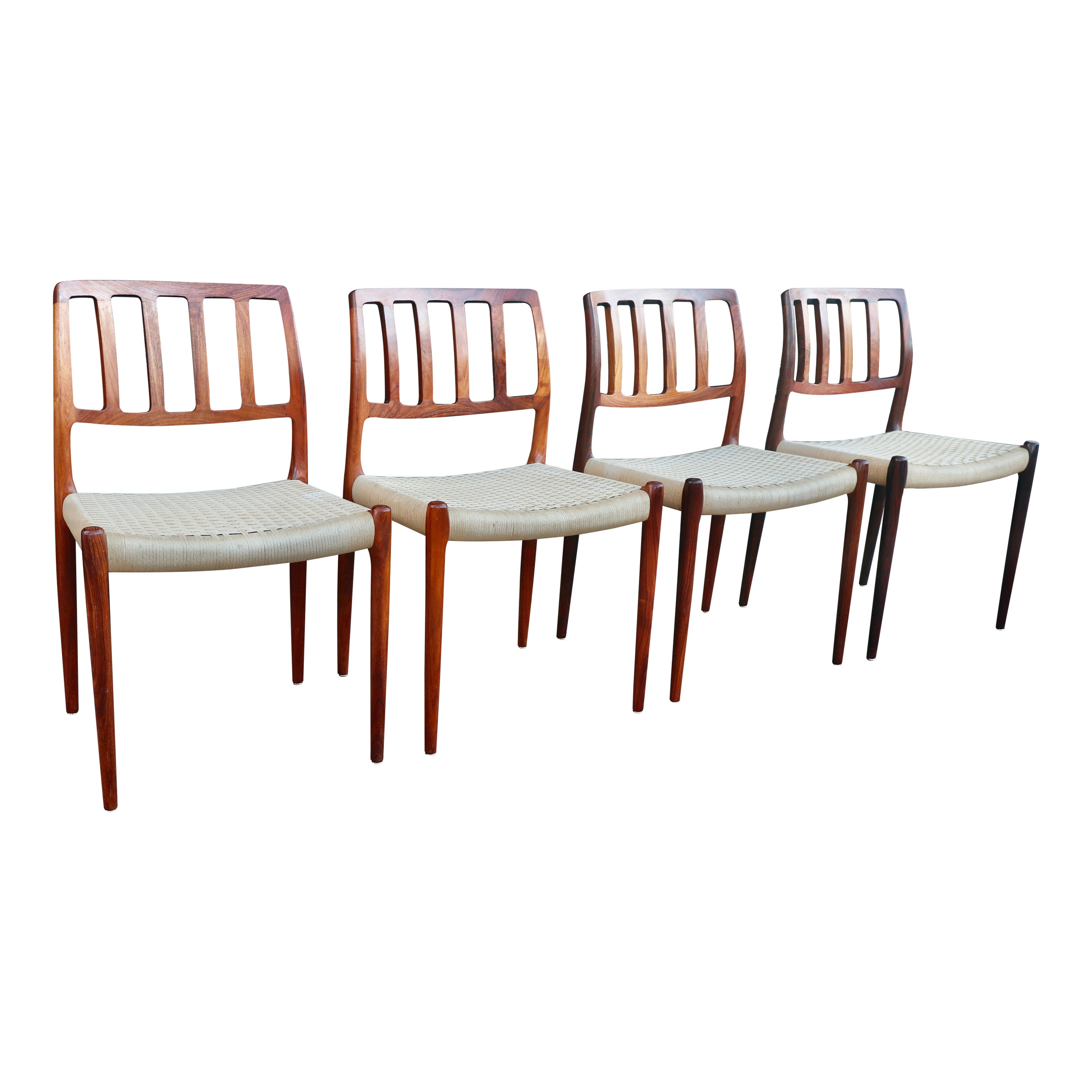 Four Niels.O Moller 83 Rosewood Dining Chairs by J.L. Mollers with woven Seats For Sale