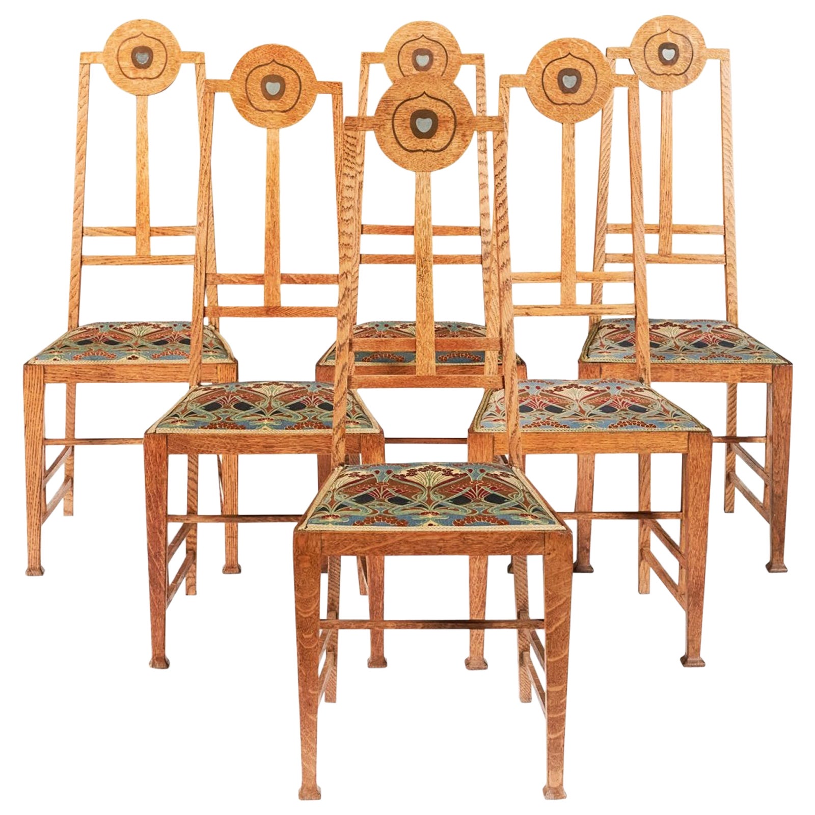 G M Ellwood pour J S Henry. Rare ensemble de huit chaises de salle à manger en chêne de style Arts and Crafts en vente
