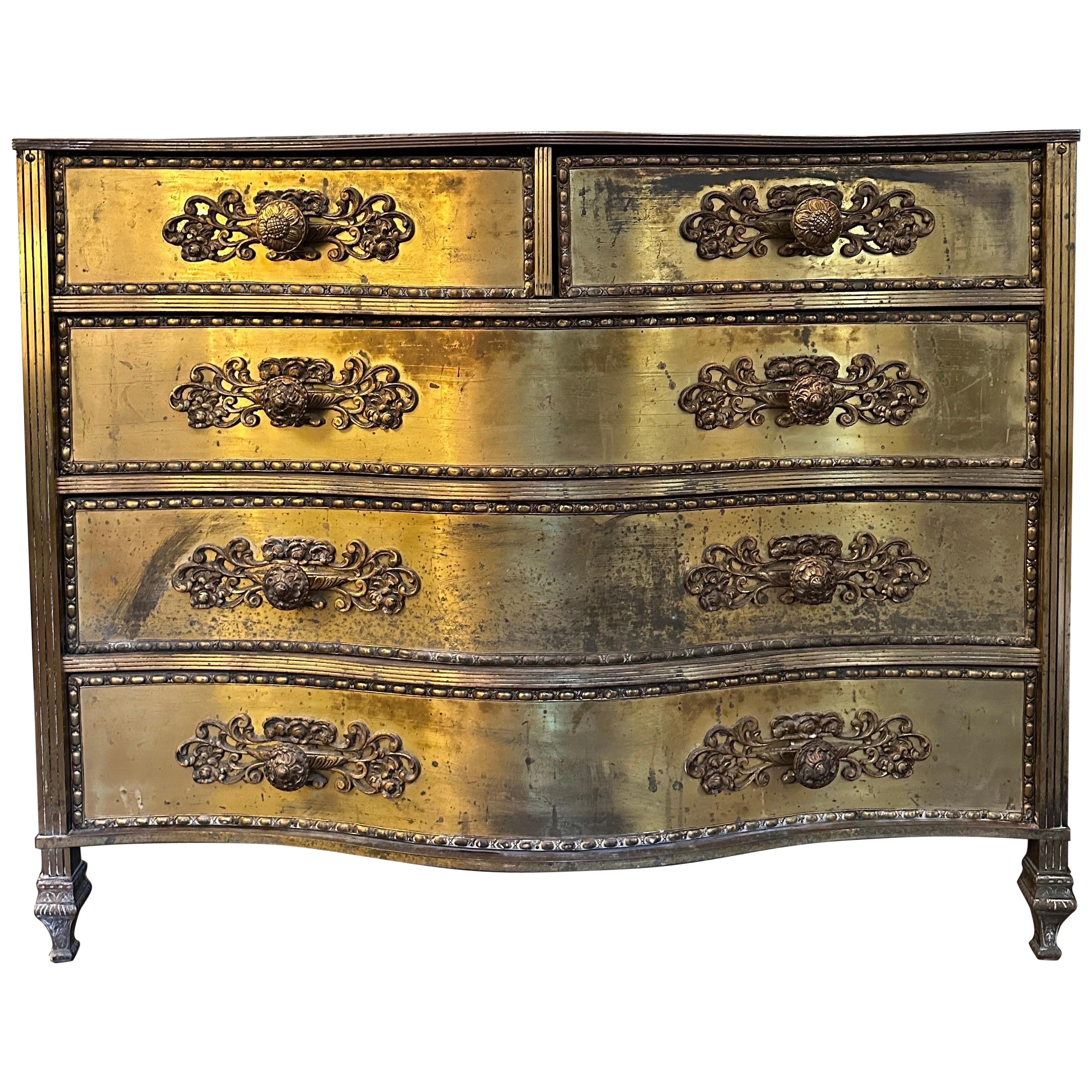 A Gilt Brass And Black Glass Serpentine Front Commode 