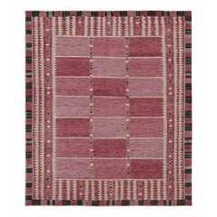 Alfombra de estilo escandinavo con motivos geométricos rosas de Rug & Kilim
