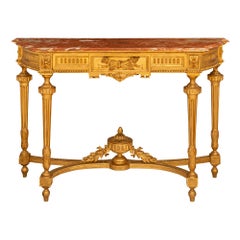 Français 19e s. Console Louis XVI en bois doré et marbre rosé Vif des Pyrénées
