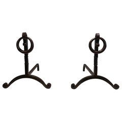 Pair of Wrought Iron Andirons. French Work in the style of Jacques Adnet