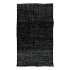 Vintage 5.5x9.2 Ft Solid Black Area Rug made of wool and cotton, Hand-Knotted in Turkey